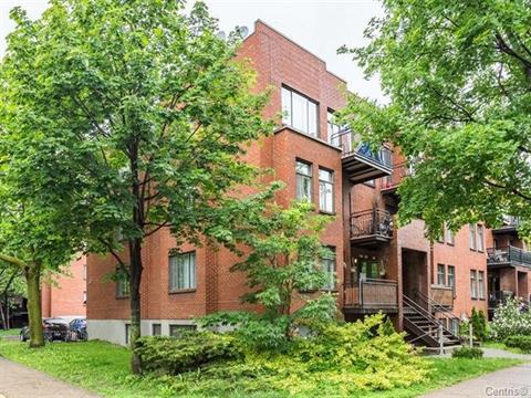 Immeuble en copropriété en briques rouges au Québec — type de bâtiment soumis à la Loi 16 sur le carnet d'entretien